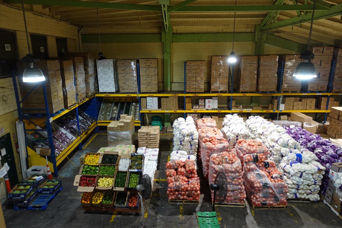 Complete warehouse view with organized produce sections